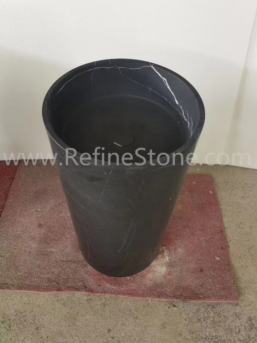 Black marquina pedestal sinks