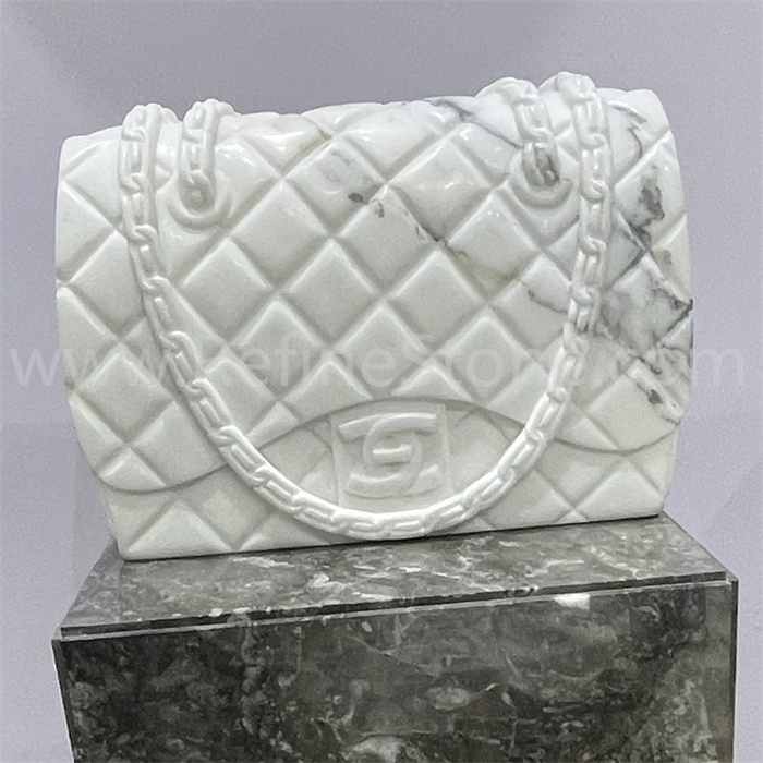 White marble bag sculpture